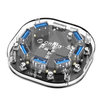 ORICO H7U-U3-CR 7-port USB3.0 Desktop Hub Support OTG Expansion Transparent Series Converter Internal Blue Light Indicator Vertical Plug-in Design Compact Convenient