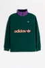 Adidas - Fleecepullover mit Violetem Stehkragen in Tannengrün (Schwarz/ Grün) - EI6362