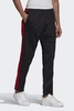 Adidas - SST OG Klassische Track Pants in Schwarz mit purpurroten Streifen - GK0661