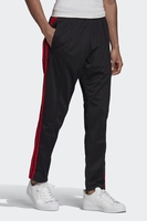Adidas - SST OG Klassische Track Pants in Schwarz mit purpurroten Streifen - GK0661