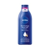 NIVEA Reichhaltige Body Milk,  mit tiefenpflegendem Serum 400 ml - Flasche