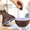 130 ml Ultraschall Aroma Diffusor Kreative Vase Holz Mini Stumm USB Luftbefeuchter Haushaltsluftbefeuchter Schlafzimmer Ätherisches Öl Aromatherapie Maschine für Home Office (dunkle farbe Holzmaserung Sieben farbe Licht)