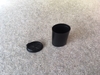 500 schwarze Filmdosen,  ovale Form