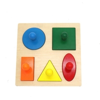 Puzzlebrett mit fünf Formen
