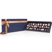 XMAS MOMENTS MAXI - 27 Pralinen und drei Sorten Schoko-Nüsse