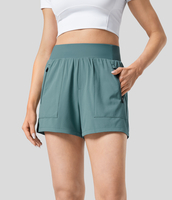 Halara - Breezeful™ schnell trocknende kurze Hose mit hohem Bund und seitlicher Reißverschlusstasche - Steinblau - M