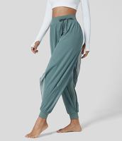 Halara - Einfarbige Flowy-Yoga-Jogginghose mit hohem Bund,  seitlichem Kordelzug und kontrastierendem Mesh - Mineral Blue - L