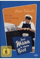 Drei Mann in einem Boot