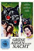 Grüne Augen in der Nacht