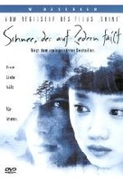 Schnee,  der auf Zedern fällt