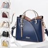 marineblaue und rosa Handtasche für Damen mit Herzquastenanhänger – elegante Umhängetasche und Tragetasche aus Kunstleder für den täglichen Gebrauch