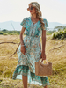 Boho Kleid V-Ausschnitt Kurzarm Ärmeln bedruckte Stretch Plissee Midi Beach Kleid
