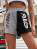 Damen Sommer Shorts Schwarze Buchstaben Muster Polyester Elastische Taille Sportliche Shorts