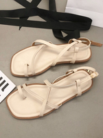 Flache Damen-Sandalen aus PU-Leder mit überkreuzten Zehen und quadratischer Zehenpartie