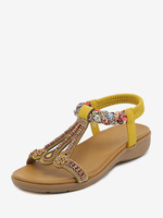 Flache Sandale. Flache offene Zehensandalen aus PU-Leder mit T-Riemen lässige Slipper-Sandalen