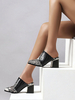 Frauen Maultiere spitzen Zehen Schlange Druck Flare Heel Plus Size Schuhe