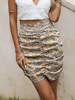 Frauen Rock Light Apricot Plissee bedruckte Polyester kurze angehobene Taille Asymmetrische Sommerböden