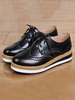 Frauen stilvolle Oxfords schwarze runde Spitze Keilabsatz Lace Up Rindsleder Casual Leder Schuhe