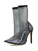 Klare Stiefel mit spitzen Zehen und hohen Absätzen und transparenten Stiefeln für Damen