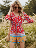 Roter Playsuit Blumen-bedruckter Sommer-Playsuit aus Polyester mit V-Ausschnitt und halben Ärmeln