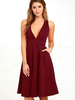 Schwarze Schlittschuhläufer-Kleid-Frauen V-Ausschnitt Sleeveless gefaltetes Flare-Kleid