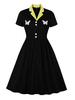 Schwarzes Vintage-Kleid 1950er Jahre Turndown-Kragen-Knöpfe geschichtet Kurzarm-Schmetterling Color Block Swing-Kleid