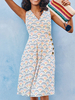 Sommerkleid V-Ausschnitt Druckknöpfe Weißes knielanges Strandkleid