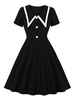 Vintage Kleider mit Farbblock Schwarz und Knöpfen Rockabilly kleid Polyester Kurzarm und Umlegekragen knielang