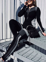 Zweifarbiger schwarzer Juwelenhals mit langen Ärmeln und Reißverschluss aus Polyester-Baumwolle für Damen