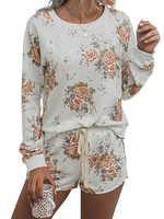 Zweiteilige Sets Weißes Polyester-Blumenmuster mit lässigen; langärmligen Juwelenhalsoberteilen und Kordelzughose