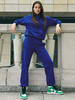 Zweiteiliges Set aus blauem Polyester mit Juwelenhals; lässiges Top mit langen Ärmeln; Outfit für Frauen